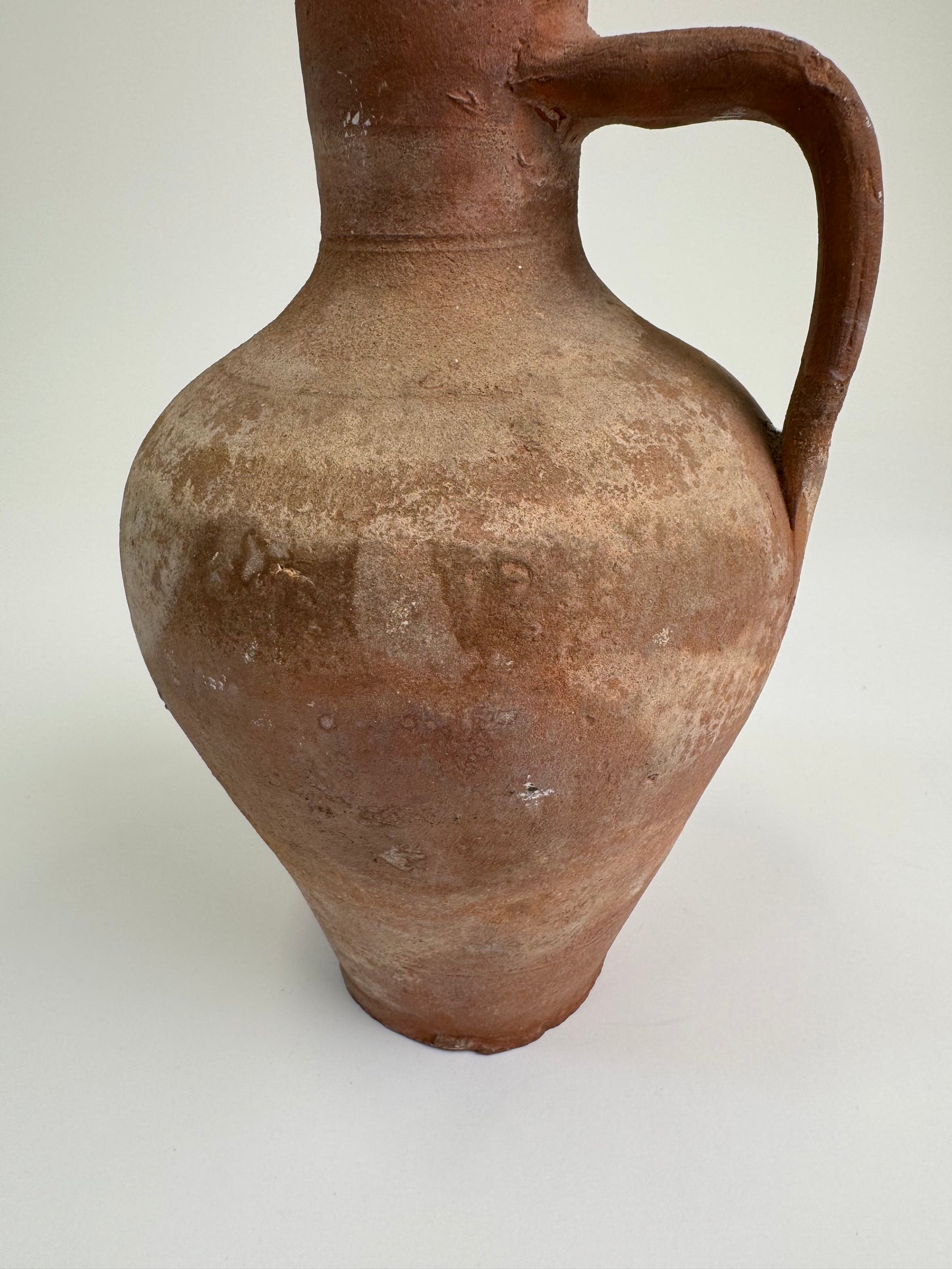 Antique terracotta jug