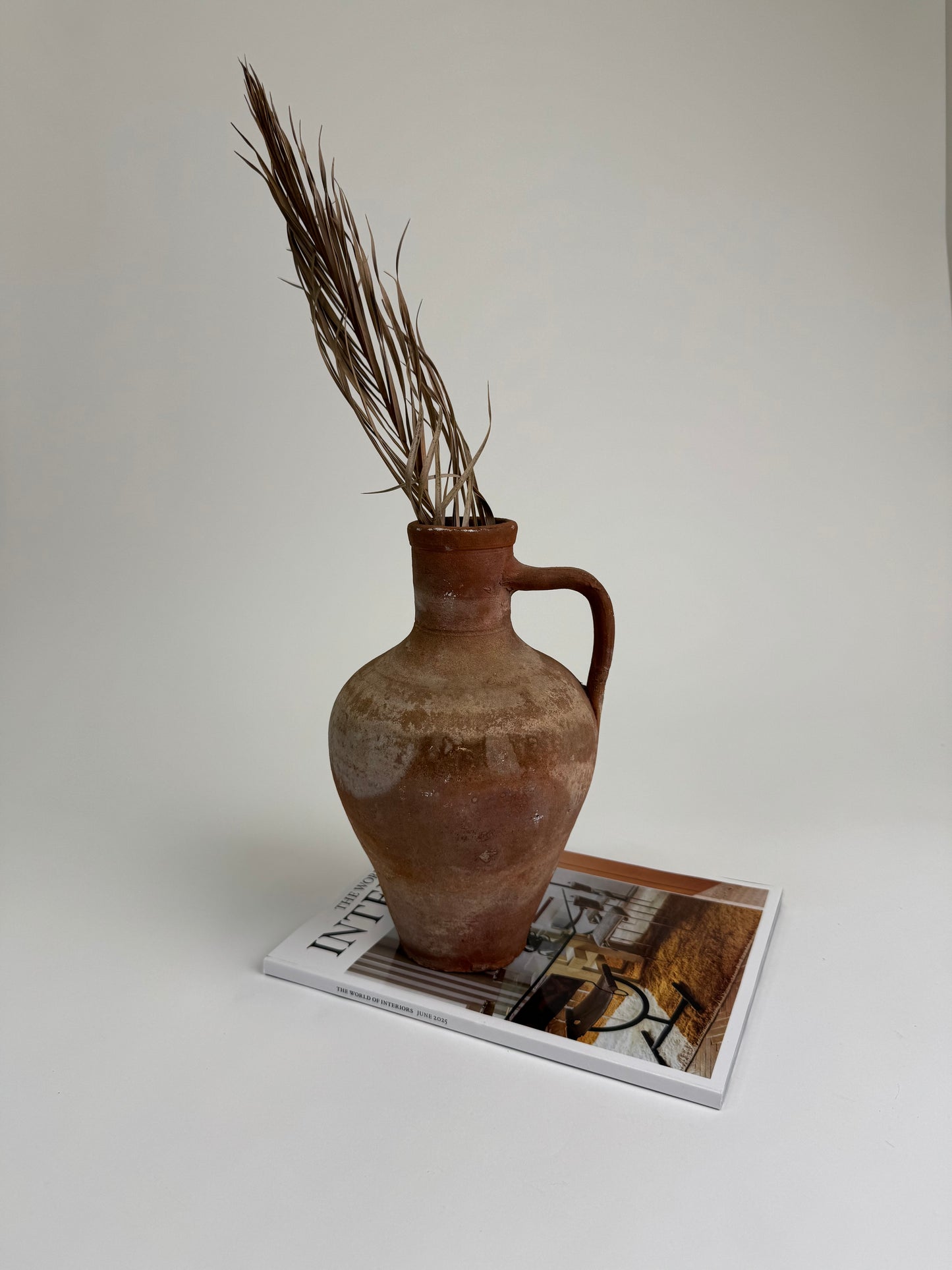 Antique terracotta jug