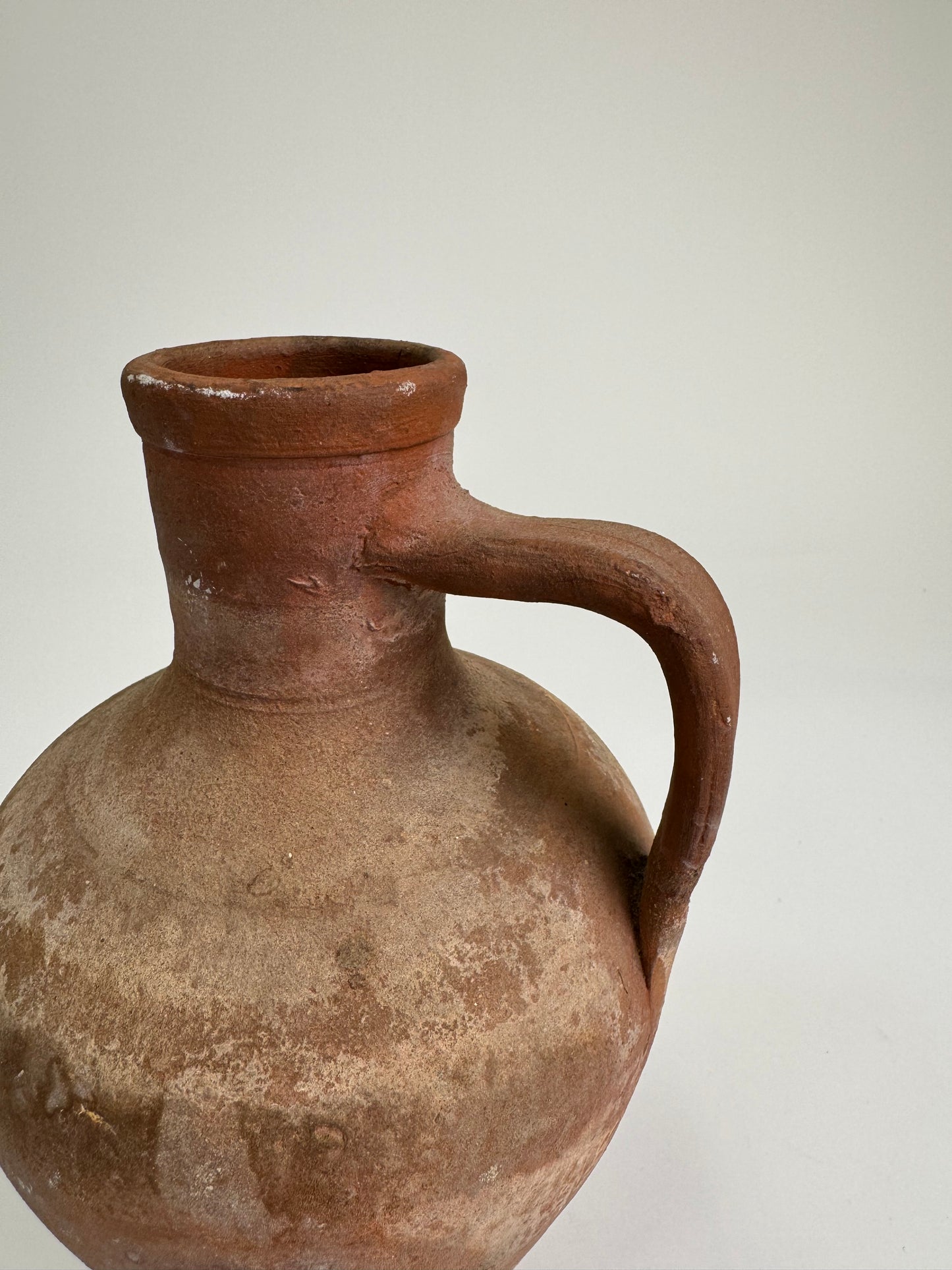 Antique terracotta jug