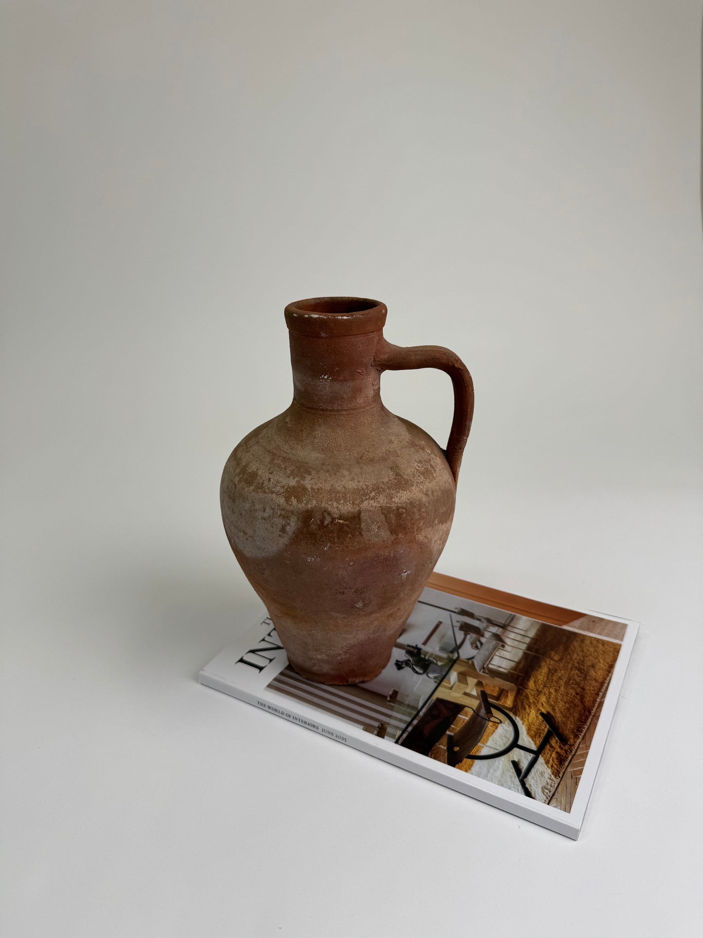 Antique terracotta jug