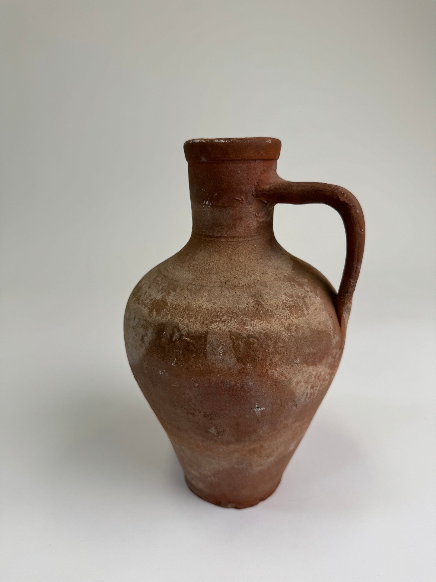Antique terracotta jug