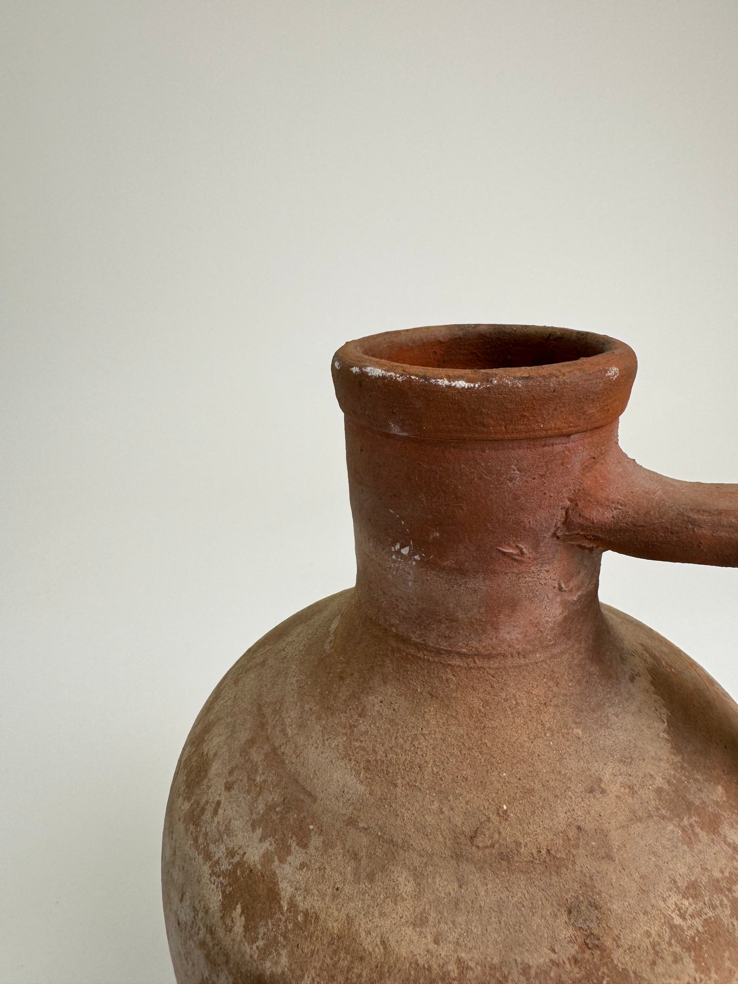Antique terracotta jug