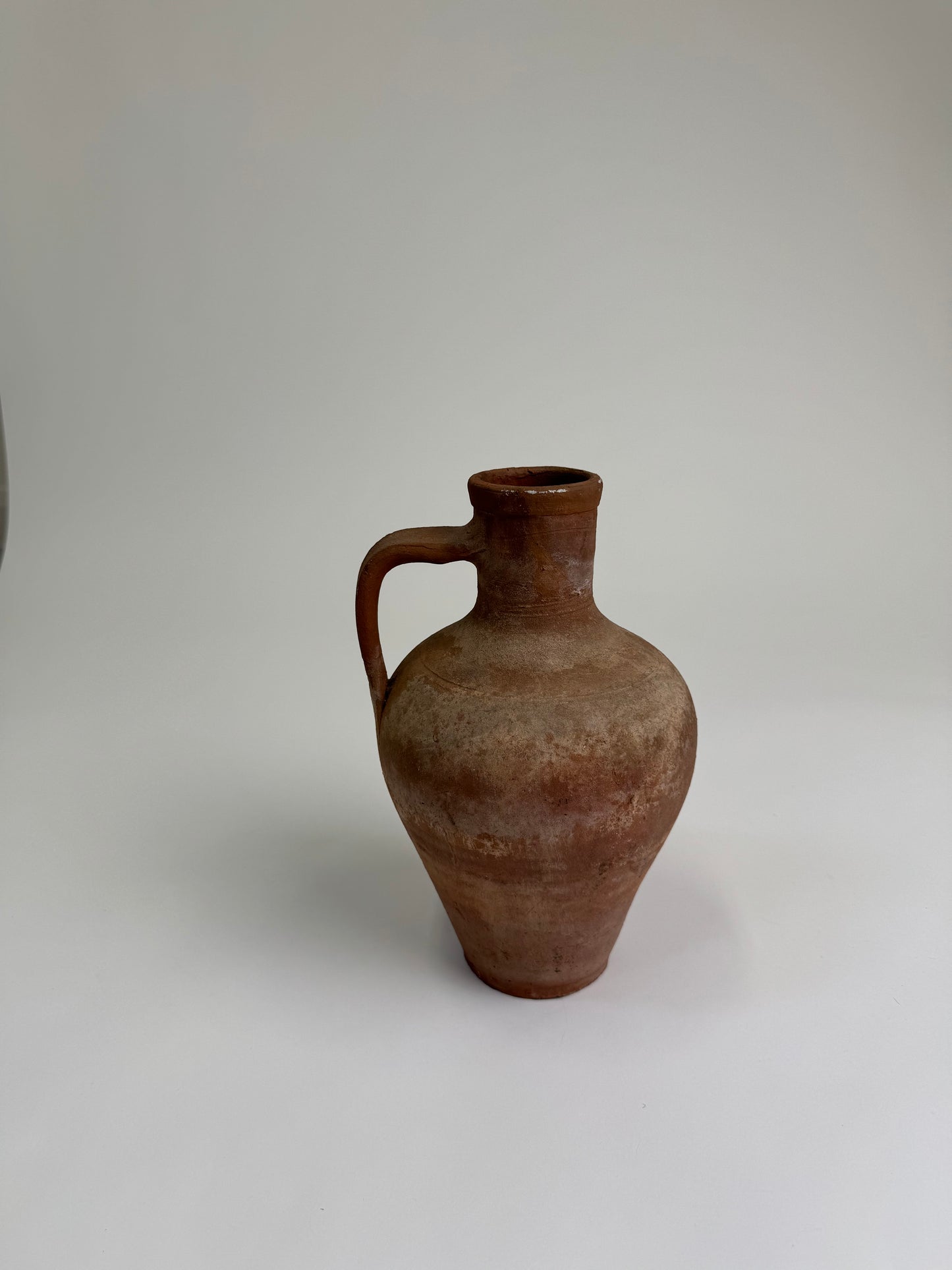 Antique terracotta jug