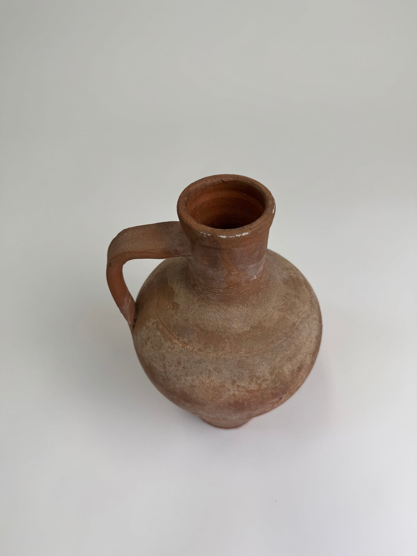 Antique terracotta jug