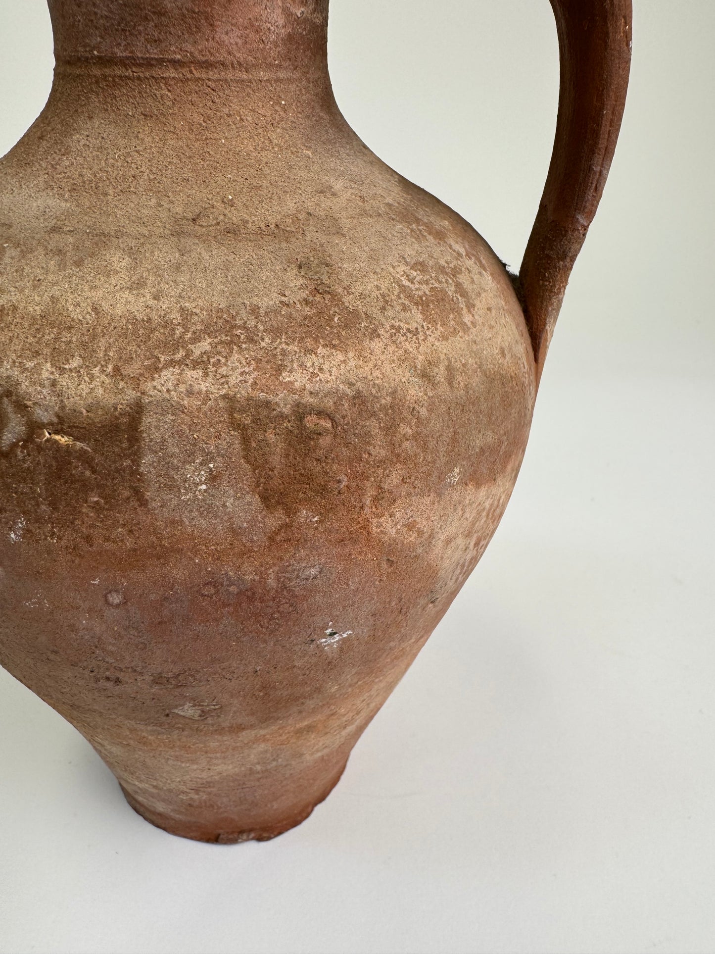 Antique terracotta jug