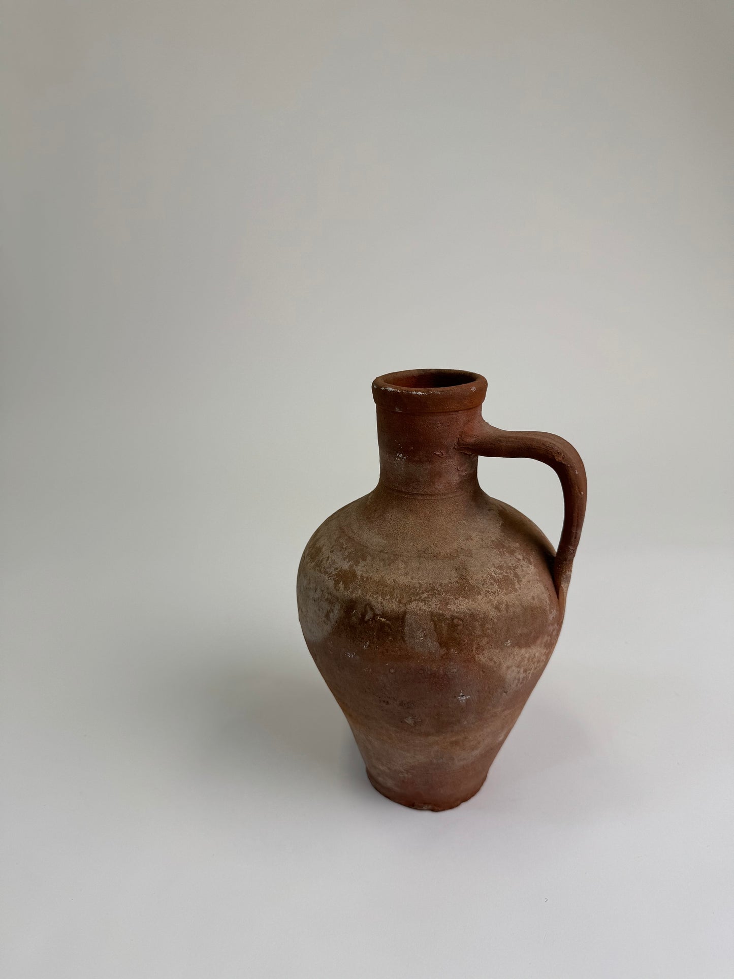 Antique terracotta jug