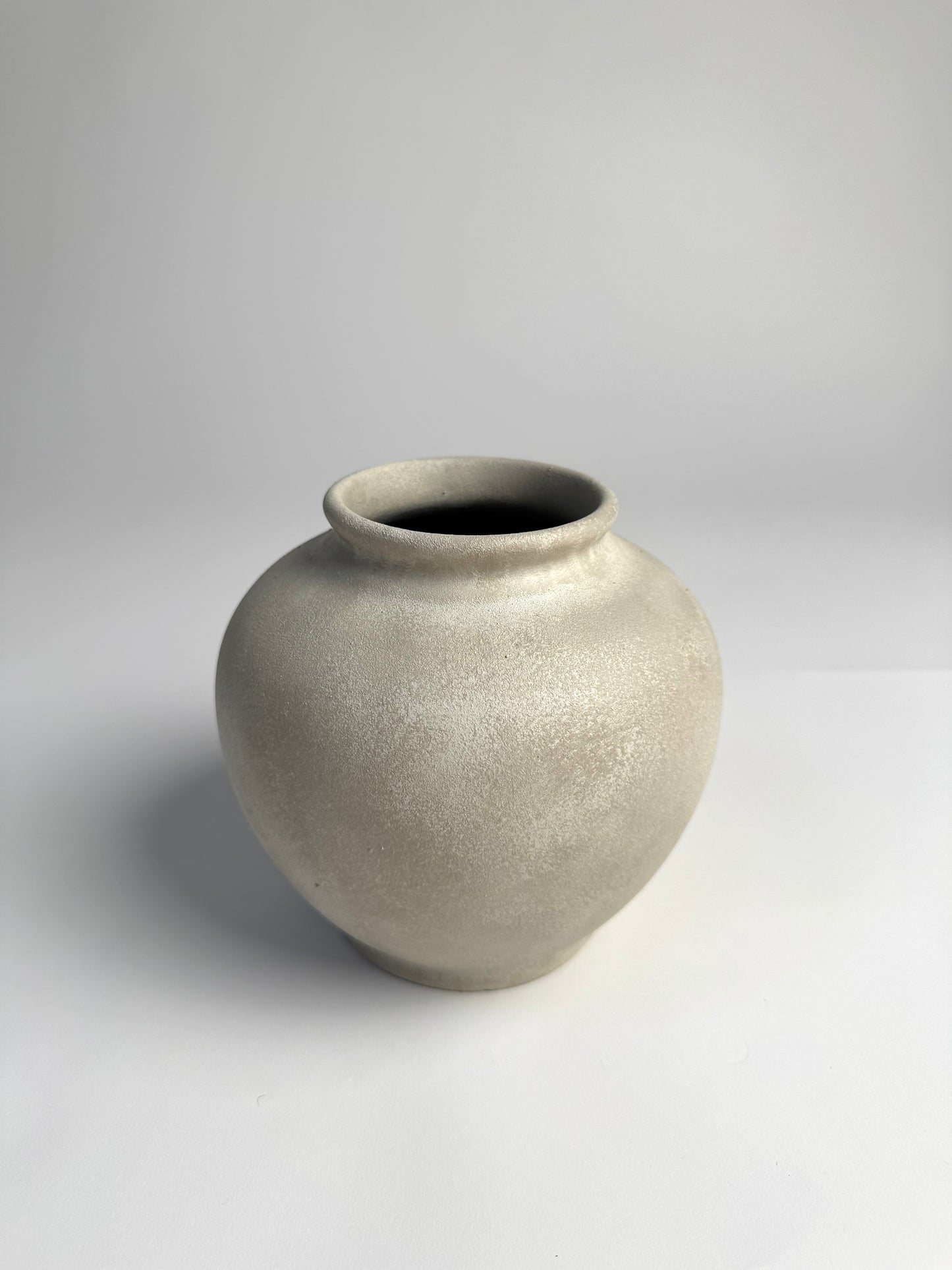 Up-cycled | WATERTIGHT light beige stone-effect rounded vase