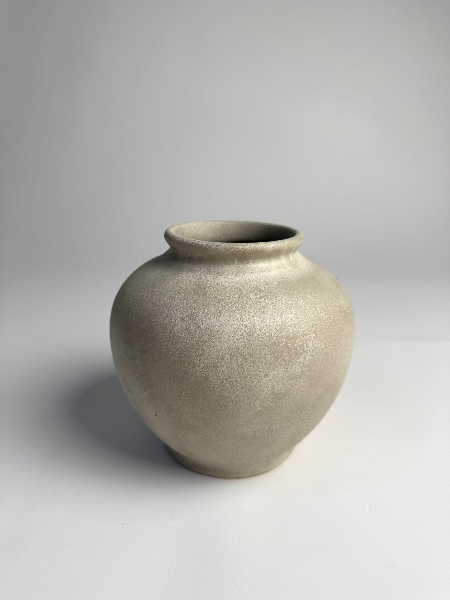 Up-cycled | WATERTIGHT light beige stone-effect rounded vase