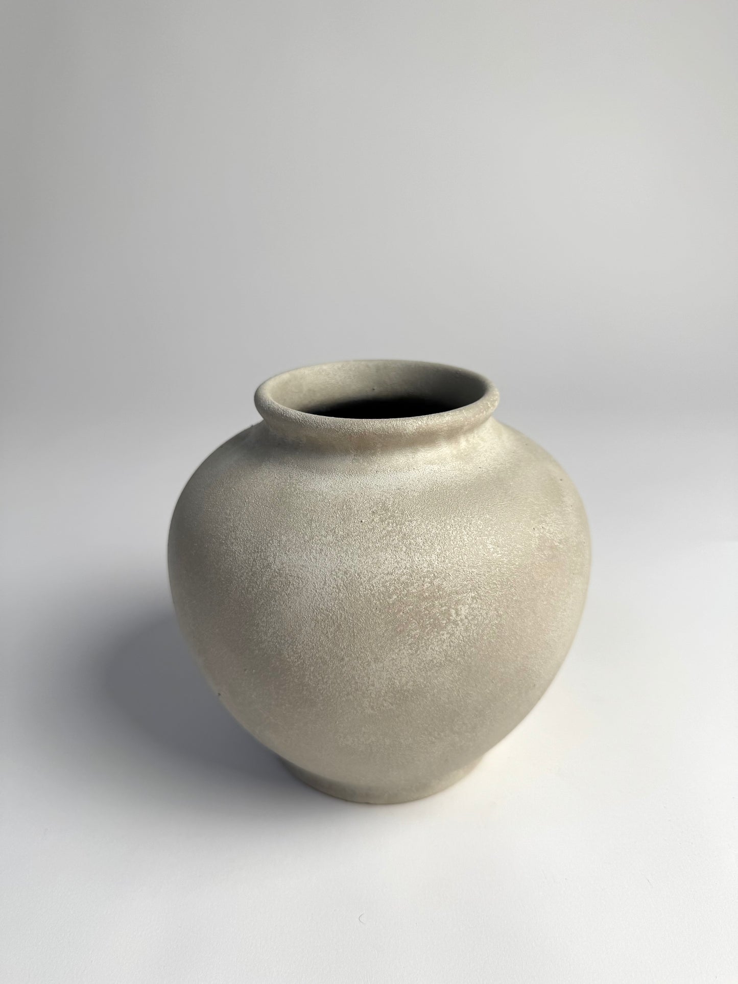 Up-cycled | WATERTIGHT light beige stone-effect rounded vase