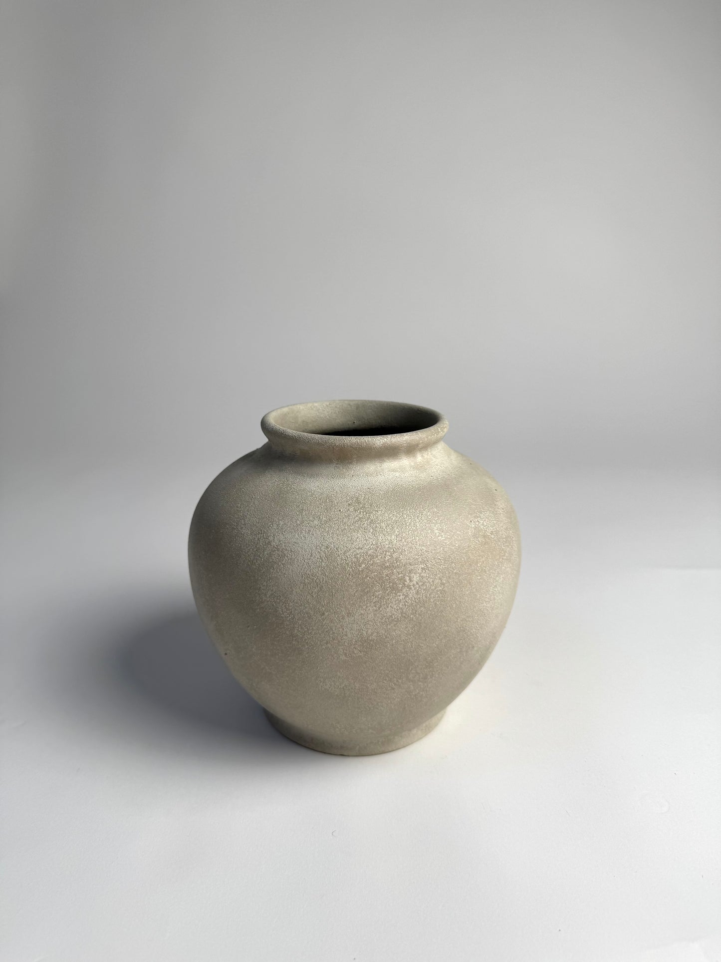 Up-cycled | WATERTIGHT light beige stone-effect rounded vase
