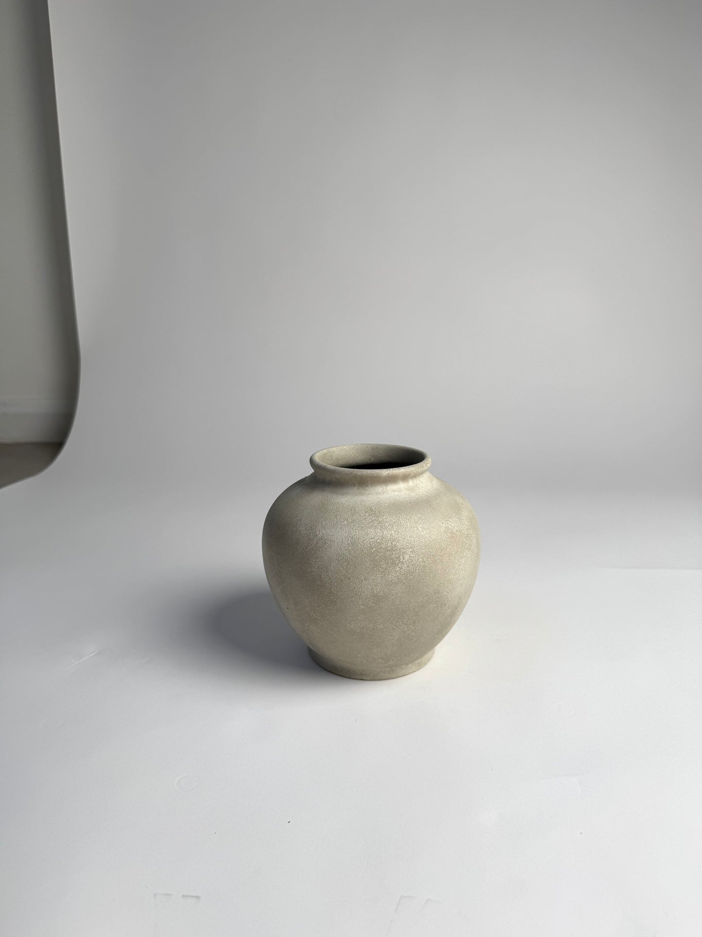 Up-cycled | WATERTIGHT light beige stone-effect rounded vase