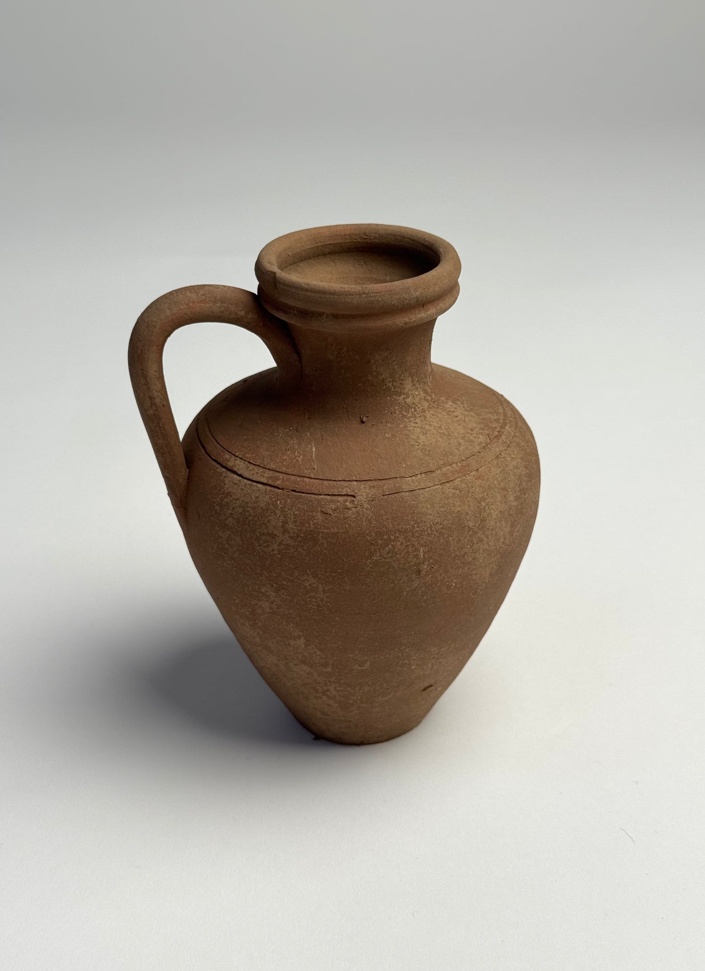 Up-cycled | earthy brown terracotta handled vessel