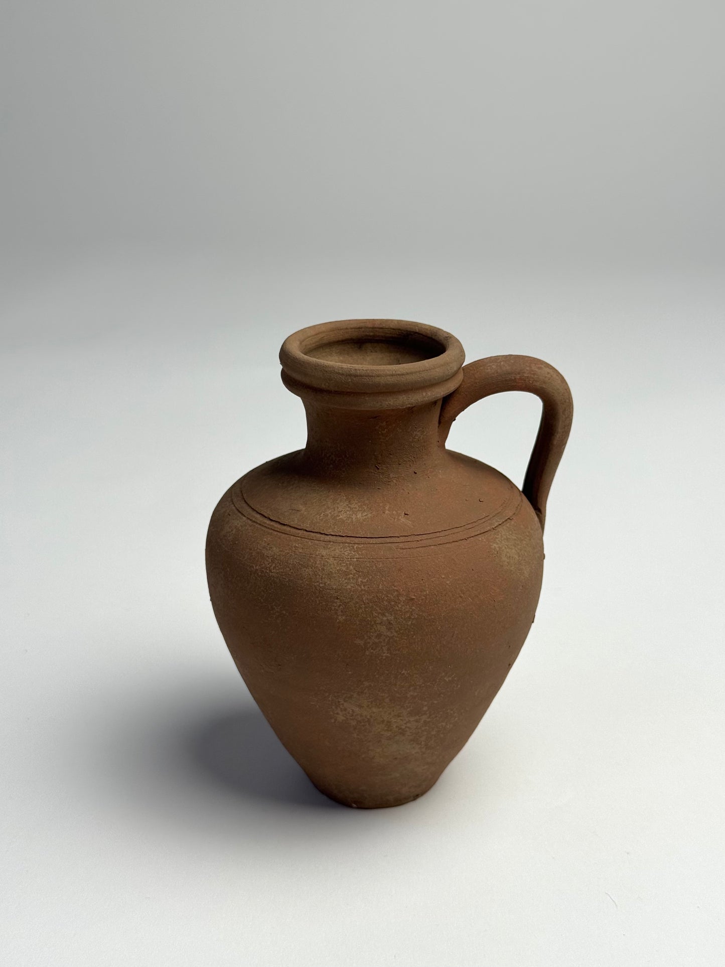 Up-cycled | earthy brown terracotta handled vessel