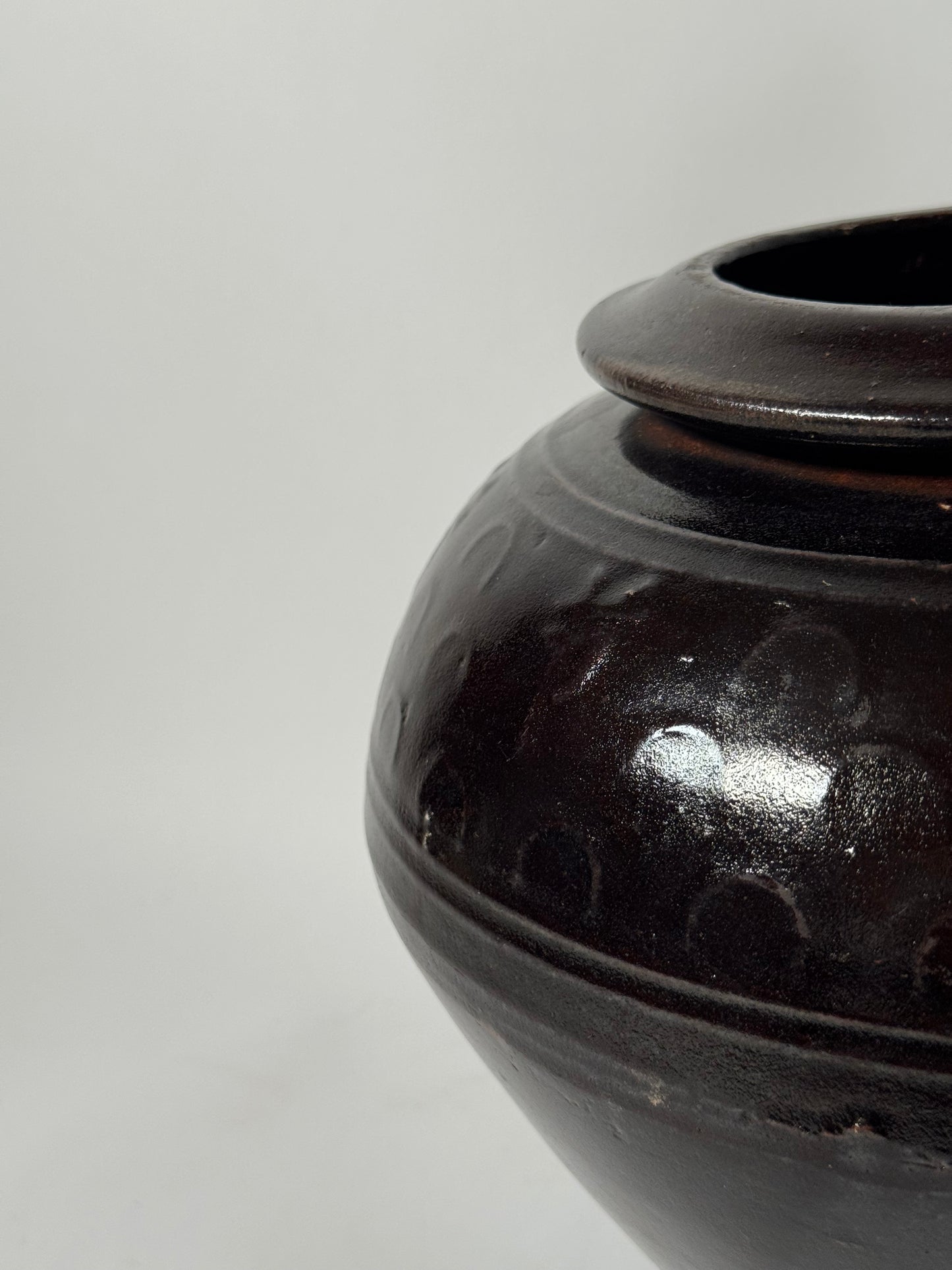 Brown Black Rounded South Asian Pot