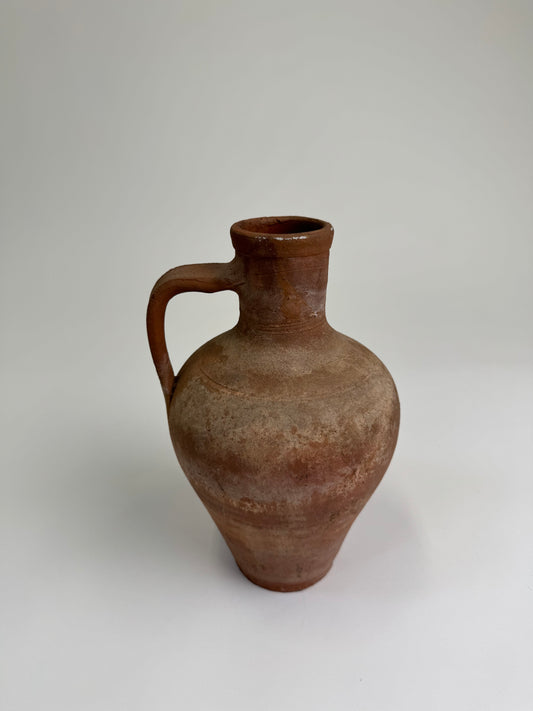 Antique terracotta jug
