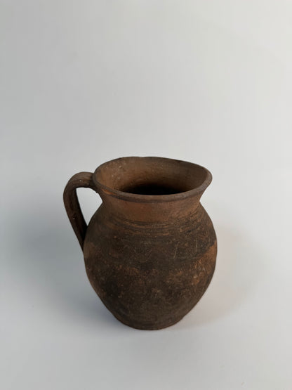 Vintage earthy pattern terracotta jug