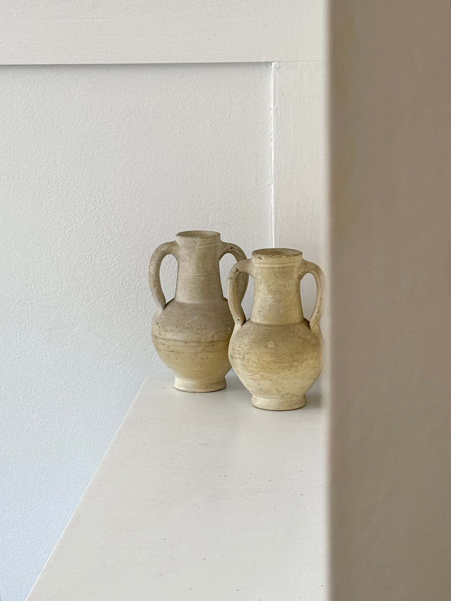 Double handled stoneware amphoras