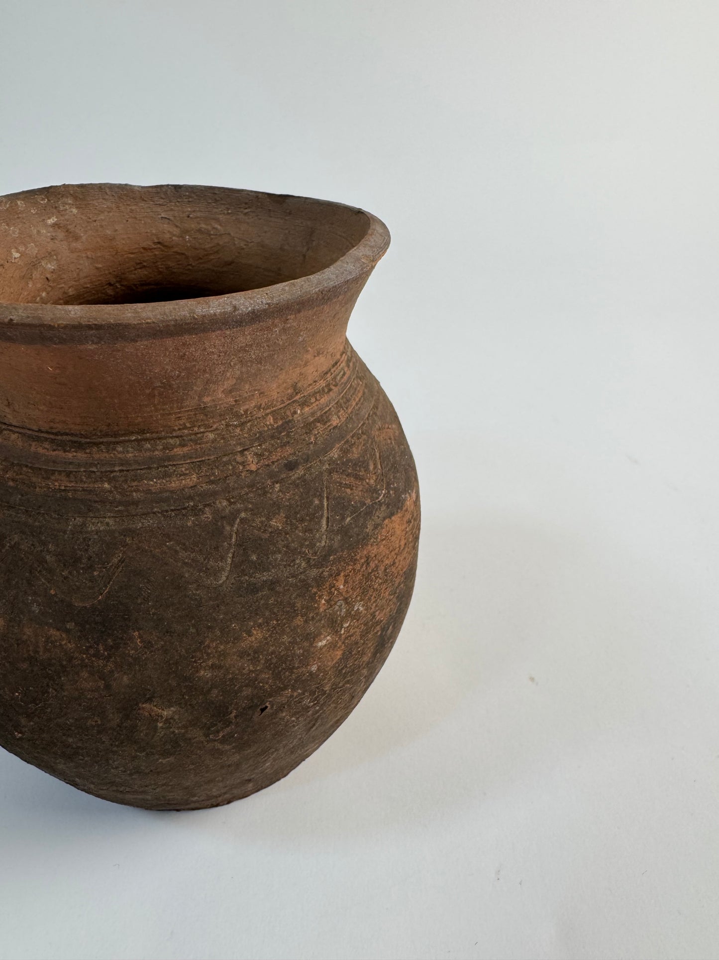 Vintage earthy pattern terracotta jug