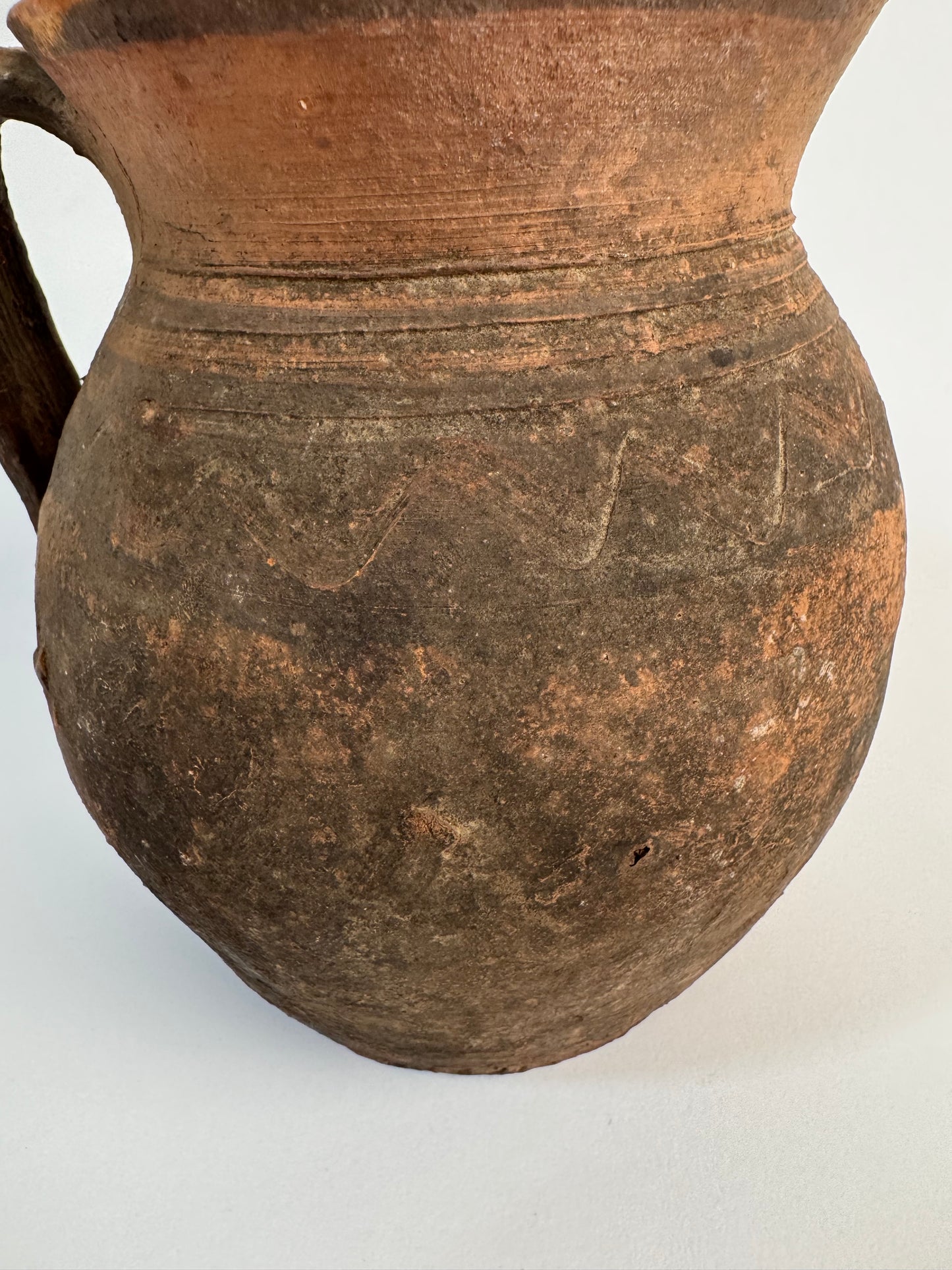 Vintage earthy pattern terracotta jug