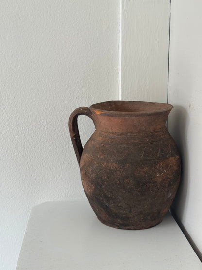 Vintage earthy pattern terracotta jug