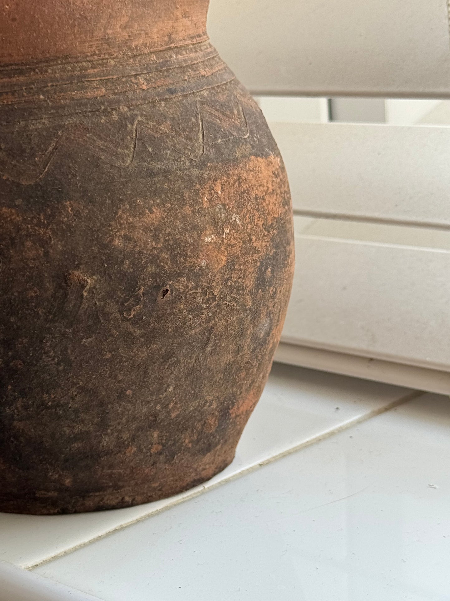 Vintage earthy pattern terracotta jug