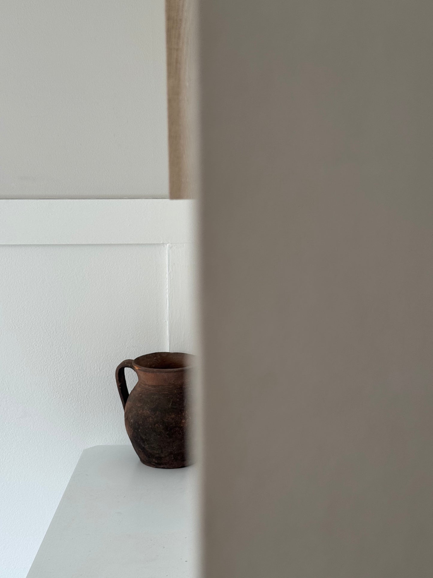 Vintage earthy pattern terracotta jug