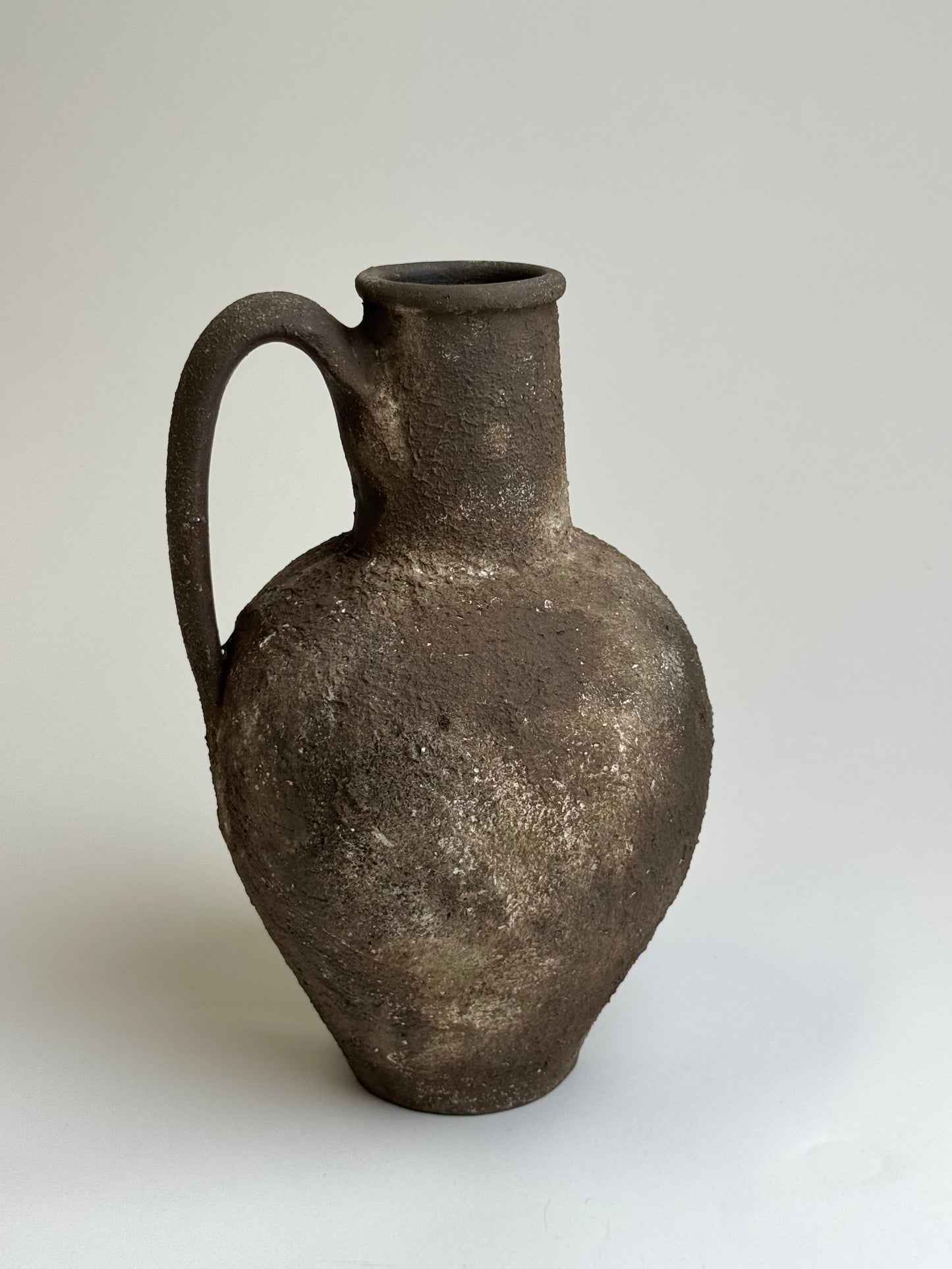 Up-cycled  |  Textured earthy brown handled jug