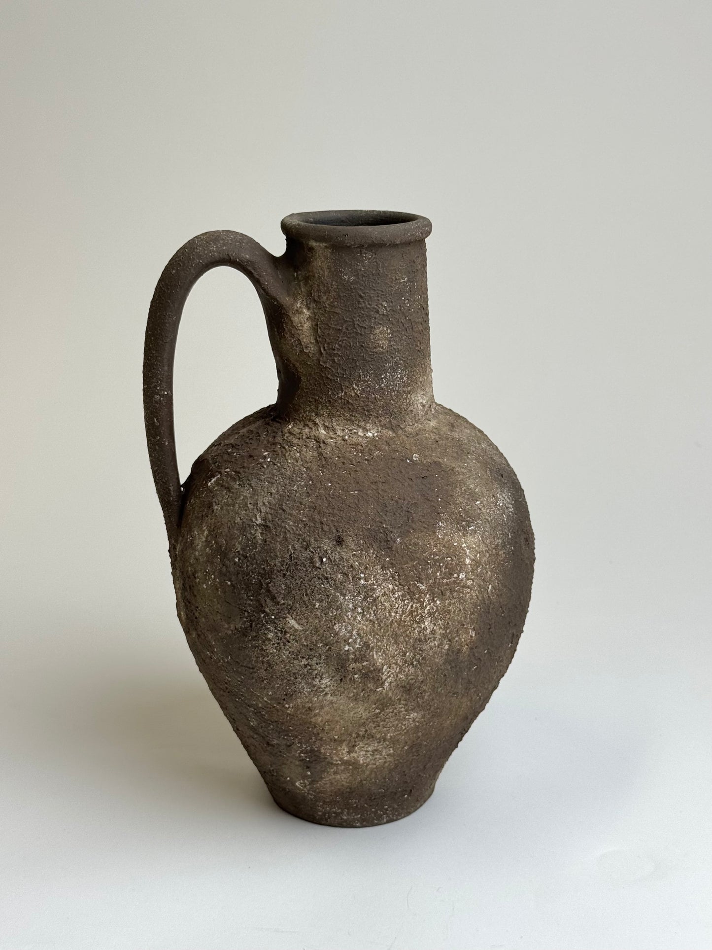 Up-cycled  |  Textured earthy brown handled jug