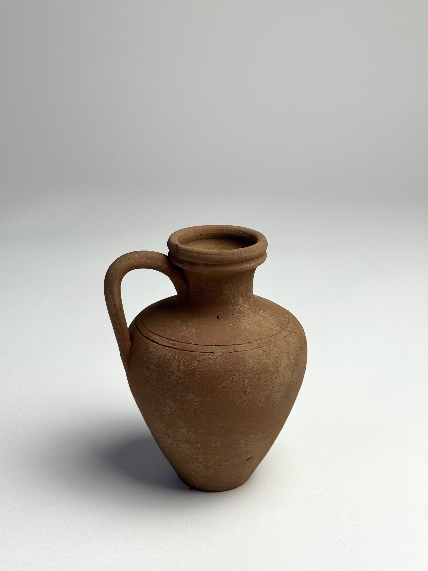 Up-cycled  |  earthy brown terracotta handled vessel