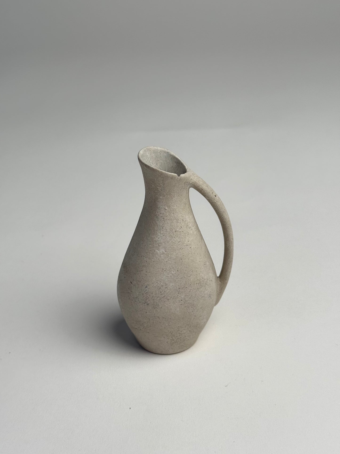Up-cycled  |  small off-white slim handled jug