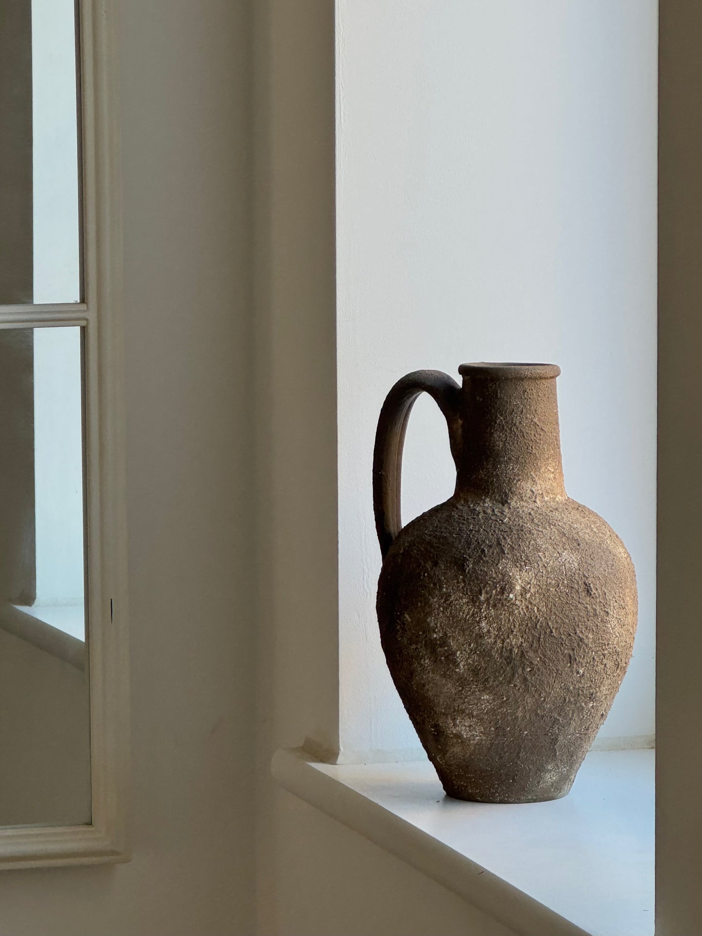 Up-cycled  |  Textured earthy brown handled jug