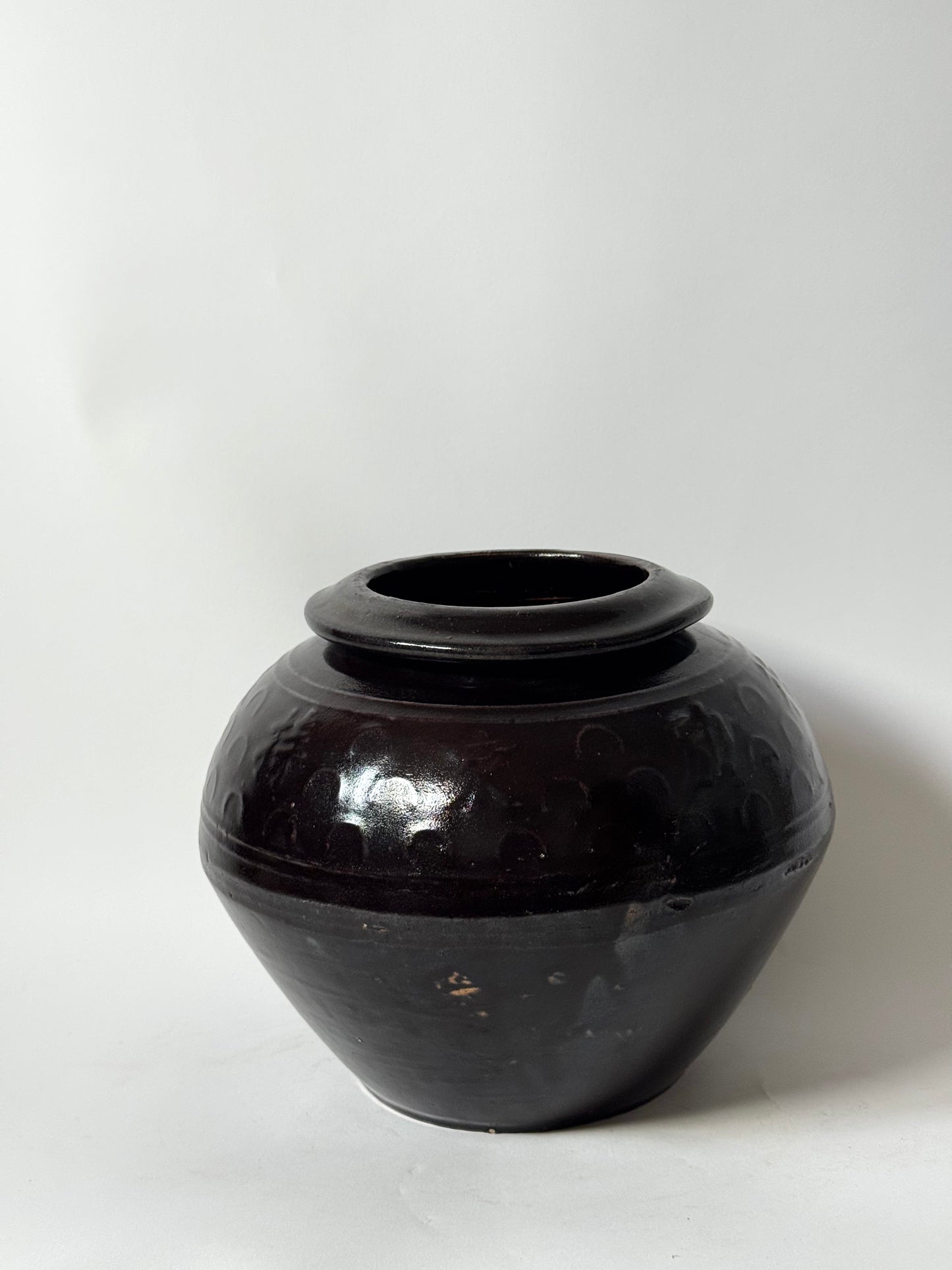 Brown Black Rounded South Asian Pot