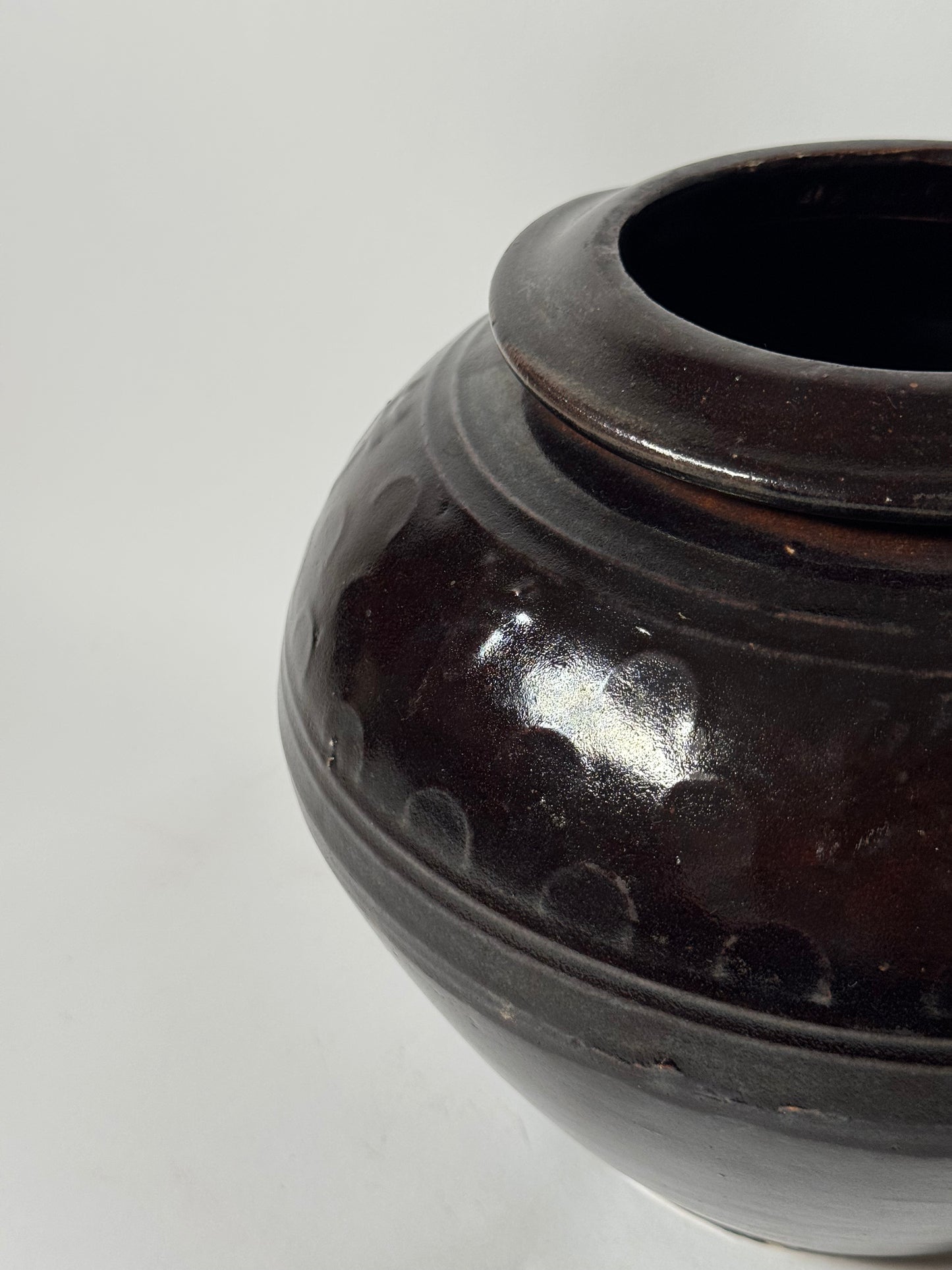 Brown Black Rounded South Asian Pot