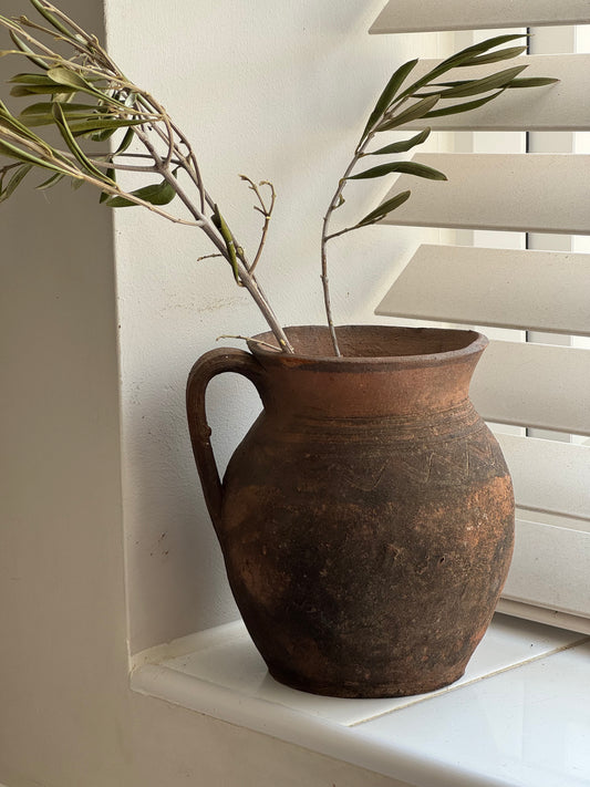 Vintage earthy pattern terracotta jug